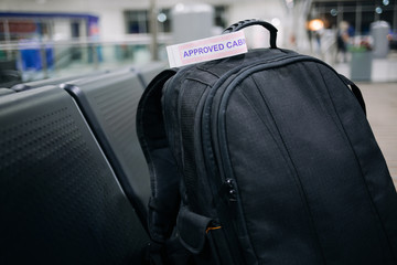 Fototapeta na wymiar Luggage in airport terminal. Cabin bag in the airport