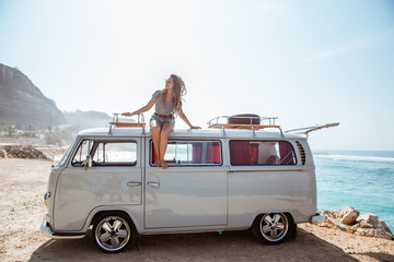beauty woman sitting enjoy blow wind on the roof  © Odua Images