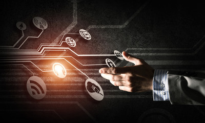 Close of businessman hand showing at user interface glowing on w