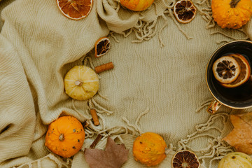 Flat lay Autumn composition. Hot tea on cozy background. Autumn, fall, halloween concept. top view, copy space