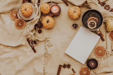 Flat lay Autumn composition. Pumpkins, candles, dried leaves on cozy background. Autumn, fall, halloween concept.top view, copy space