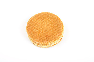 Dutch waffle called a stroopwafel isolated on a white background.