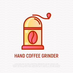 Naklejka premium Hand coffee grinder with coffee bean thin line icon. Modern vector illustration for cafe logo.