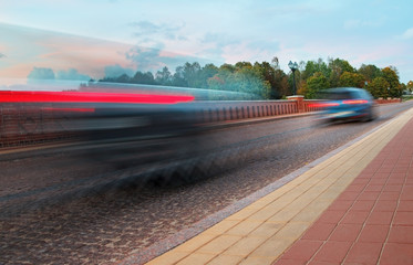 Old brick bridge with car.