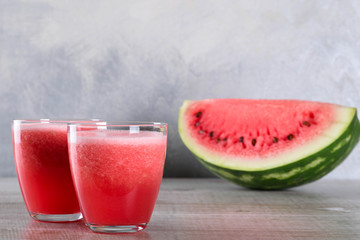 Watermelon smoothie on wood background , healthy drink. Summer. Watermelon pieces.