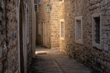 Fototapeta na wymiar Stunning view of the street in old Budva town. Montenegro, Europe