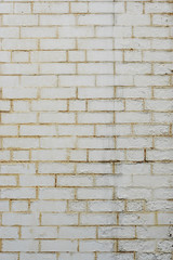 PEELING PAINT ON DAMP BRICK WALL BACKGROUND