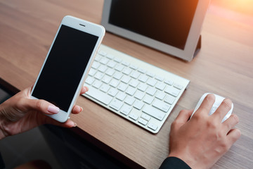 businesswoman hands using table and cell phone