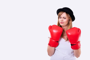 Portrait of woman in red boxing gloves