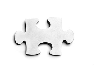 Piece of jigsaw puzzle on white background