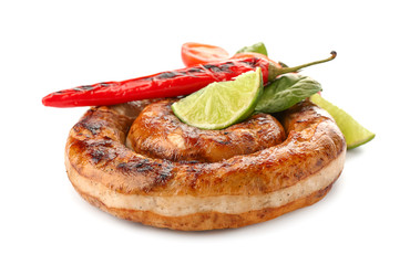 Delicious sausage with chili and lime on white background