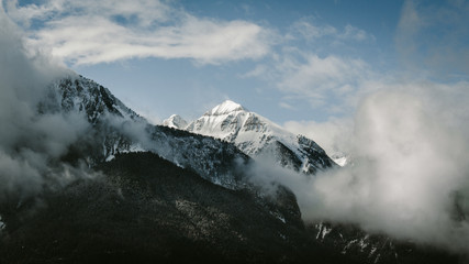 view of mountains in winter with nice clouds