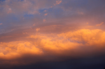 RED AND ORANGE CLOUDS AT SUNSET