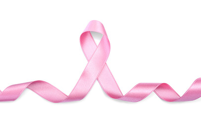 Curled pink ribbon on white background. Breast cancer concept