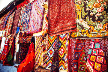 Amazing traditional handmade turkish carpets in souvenir shop.