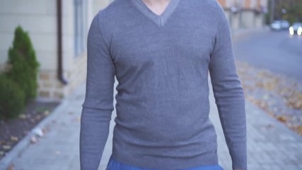 Portrait visually impaired man in glasses with a cane in the autumn city