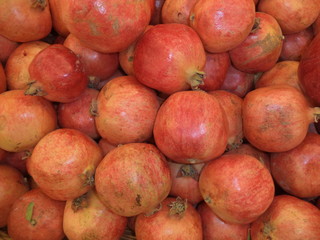 a lot of fresh ripe pomegranates