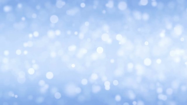 Rising white snow dust particles on blue background. Winter theme animation UHD loop