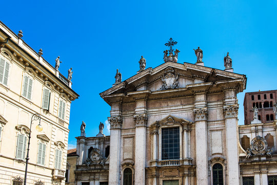 The central square in Mantua (Montova in Italian). he building to the right is the cathedral dedicated to St Peter and is the seat of the Bishop of Mantua.