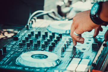 dj controller with hands of dj