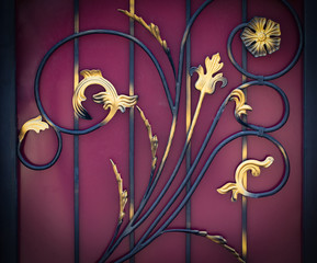 wrought-iron gates, ornamental forging, forged elements close-up