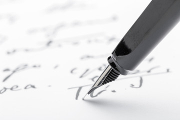 Fototapeta premium Fountain Pen on Written Page