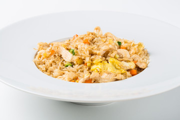 Grilled rice with chicken and egg vegetables in a white dish