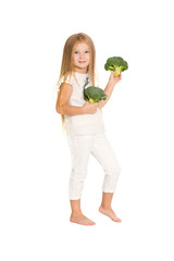 Happy child with vegetables broccoli
on a white background.  Concept of healthy vegetarian food