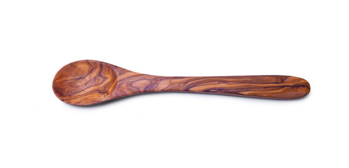 Wooden spoon, close-up on a white background