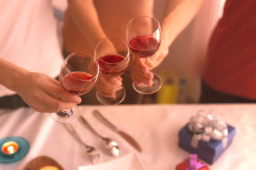 close up hand of celebration the team's success couple or friendship which happy moment relaxing ,red,wineglass,celebration on the in the office