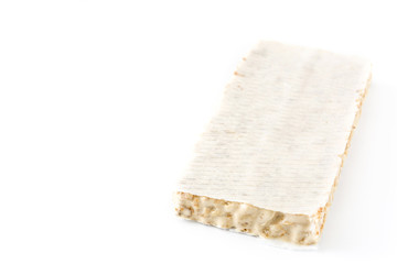 Typical christmas almond nougat isolated on white background. Copyspace