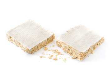 Typical christmas almond nougat isolated on white background