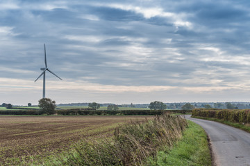Fototapeta premium Wind turbine over the countryside