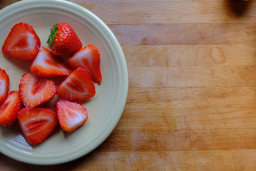 Sweet, delicious and colorful strawberries on a plate