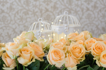 Bouquet of peach roses with garlands and cells