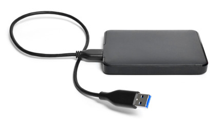 Obraz premium External hard disk with cable, isolated on white background. Small modern hard drive, PC security.