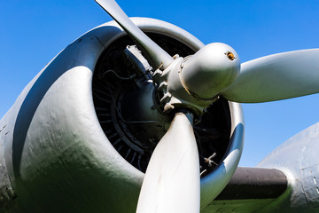 The propeller of an old plane shot close-up.