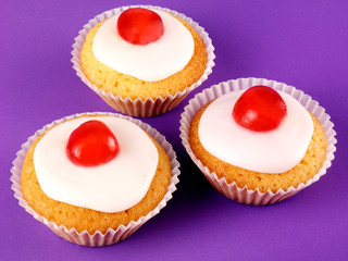 THREE CHERRY CUPCAKES