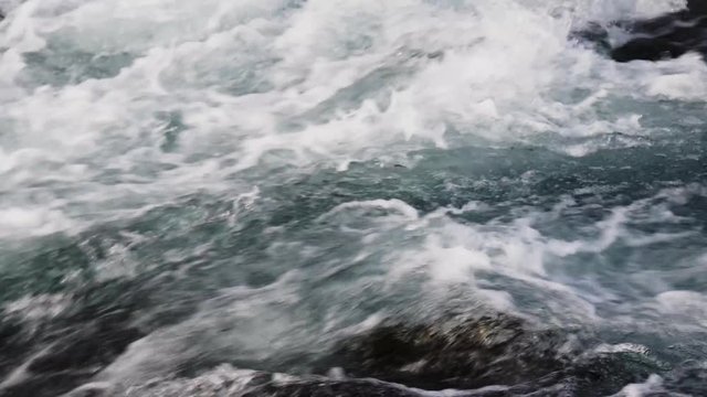 Flowing water in Foss waterfall Iceland