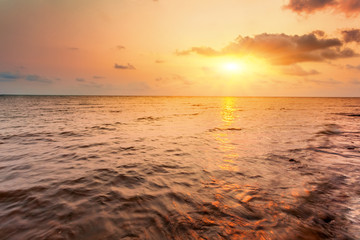 Sunset sky above sea, summer landscape