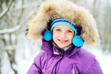 Adorable kid girl in winter