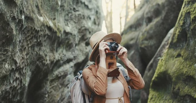 Portrait woman taking pictures with vintage camera. travel girl spring. beautiful attractive fun photography