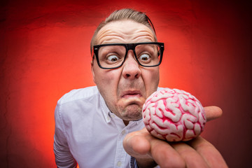 Crazy teacher or scientist with brain