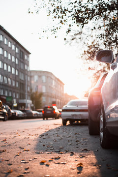 road and buildings at city with sunset