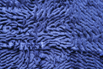 blue dirty mat or fabric doormat and worm carpet for wipe foot on front door floor or home ground and top view for texture and background or wallpaper