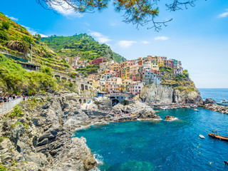 Manarola, Italy - Jun 17, 2018: Ancient village in Cinque Terre, Italy in the province of La Spezia, situated in a small valley in the Liguria region of Italy