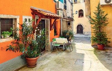 Lovran, Croatia. Cosy streets of ancient old town with vintage