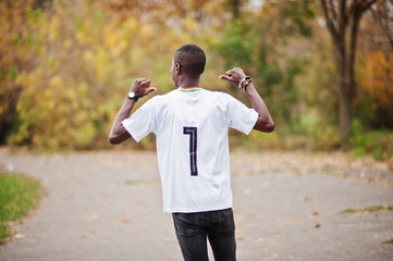 African man in white football sport t-shirt of Ghana Africa country with 7 number.