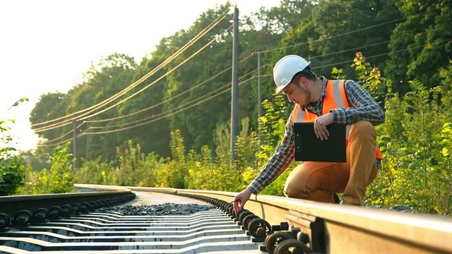 The service and control of the railway track are performed throughout the track. RAW video recording.