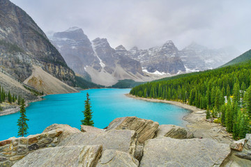Naklejka na ściany i meble Beautiful turquoise waters of Moraine lake in Banff National Park, Alberta, Canada